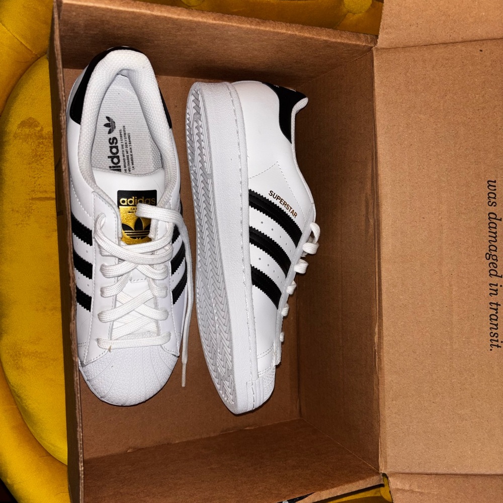 Adidas Superstar White with Black Stripes. Never worn. Size 6